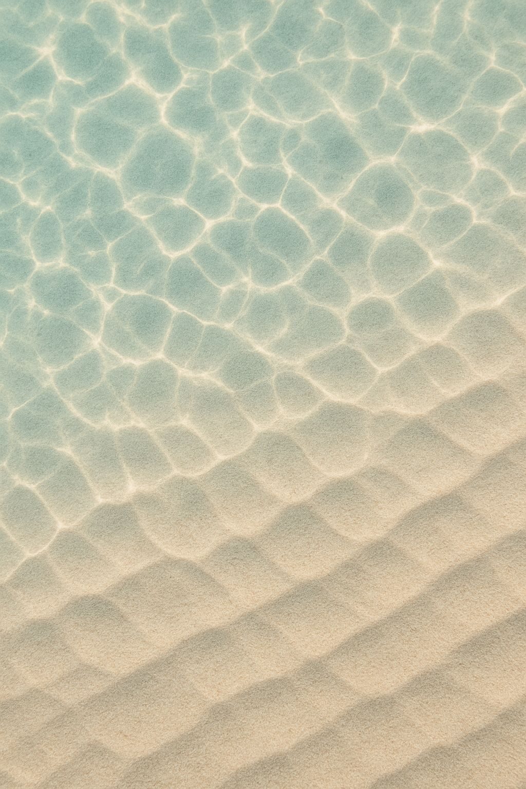 Water rippling gently towards the shore